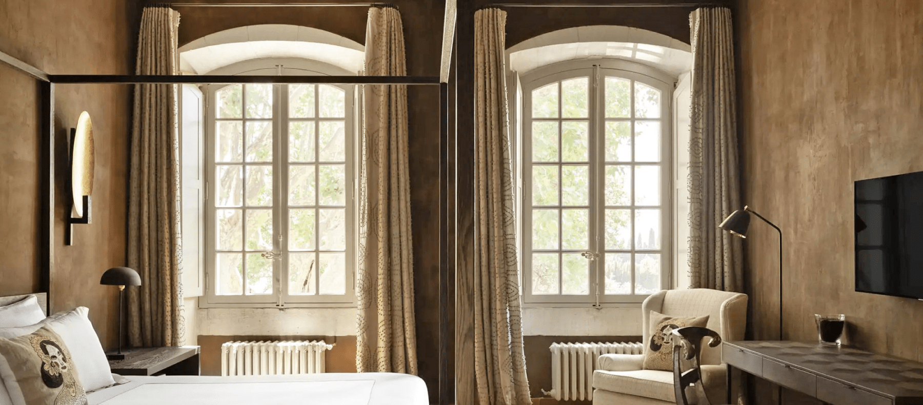 Tree overhanging a gateway into a Villa